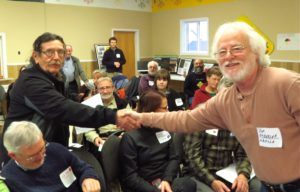 Kenneth Francis accepting solidarity statement on Aboriginal Title Claim from Jim Emberger, NBASGA @ NBEN Annual Meeting (photo Mark D'Arcy)